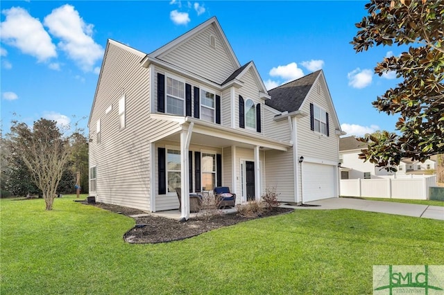 traditional home featuring a porch, a front yard, fence, a garage, and driveway