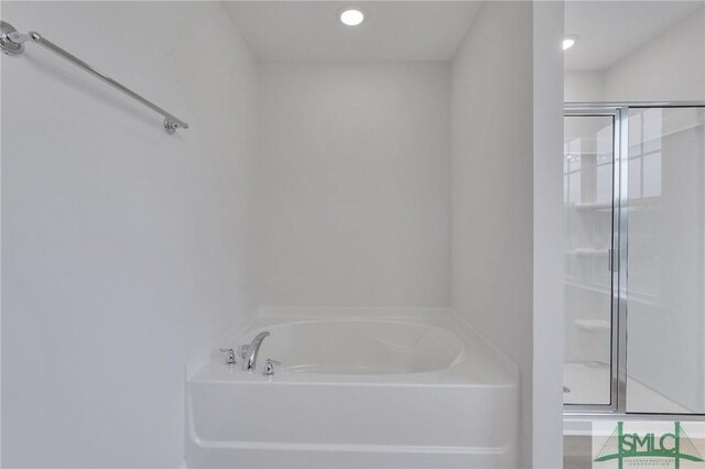 176 Orkney Rd, Savannah, GA 31407 - bathroom featuring a garden tub and a stall shower