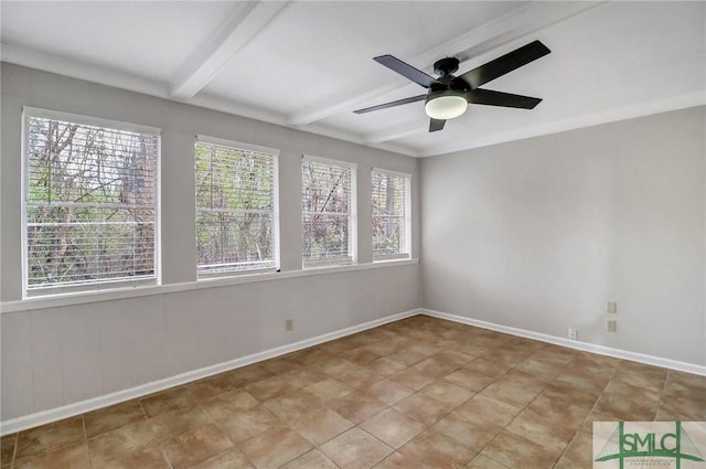 unfurnished room with ceiling fan, baseboards, and beamed ceiling