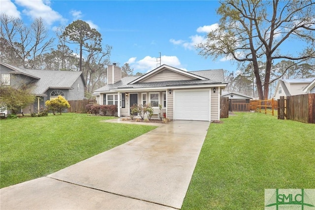 view of front facade featuring a garage, a chimney, a front lawn, and concrete driveway