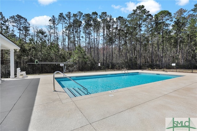 80 Rimmon Ct, Richmond Hill, GA 31324 - pool featuring a patio area and fence