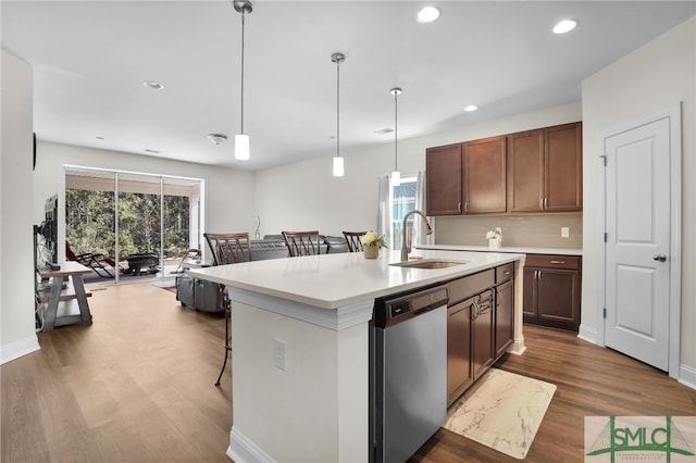 80 Rimmon Ct, Richmond Hill, GA 31324 - kitchen featuring dark wood-style flooring, light countertops, stainless steel dishwasher, a sink, and recessed lighting
