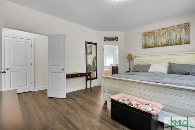 80 Rimmon Ct, Richmond Hill, GA 31324 - bedroom with dark wood finished floors, baseboards, and ensuite bathroom