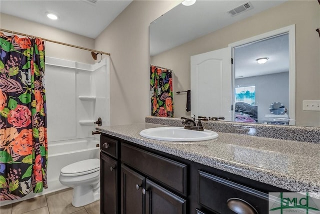 full bath with tile patterned flooring, toilet, vanity, visible vents, and shower / bath combination with curtain