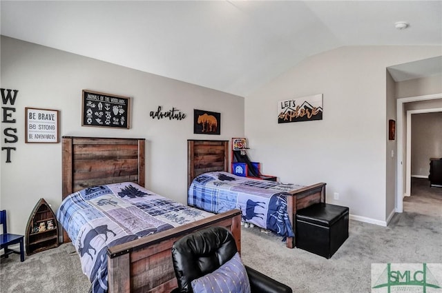 carpeted bedroom featuring vaulted ceiling and baseboards