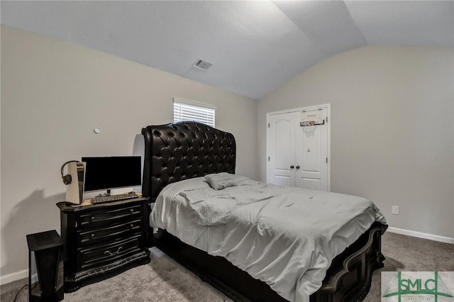 bedroom featuring lofted ceiling, carpet floors, visible vents, and baseboards