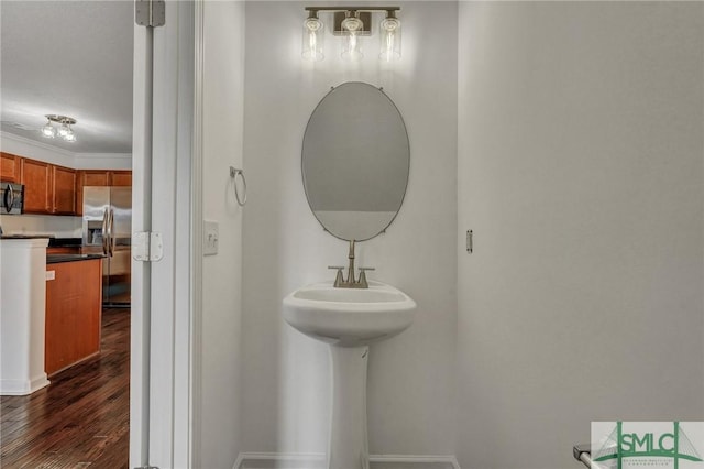 bathroom featuring wood finished floors