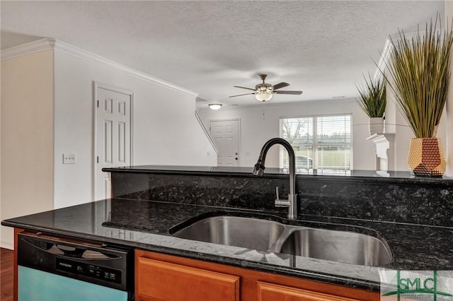 kitchen with dishwasher, brown cabinets, dark stone countertops, a textured ceiling, and a sink