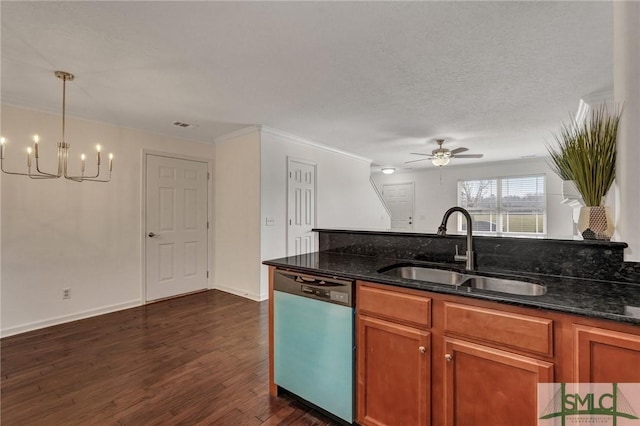 kitchen with dark stone counters, dark wood-style floors, a sink, brown cabinets, and dishwasher