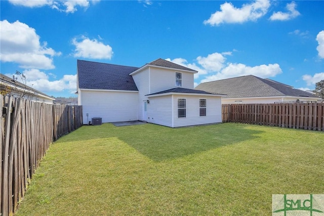 back of house featuring a fenced backyard, central AC unit, roof with shingles, and a yard