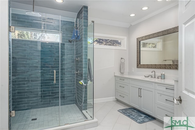 bathroom with crown molding, a stall shower, a wealth of natural light, and vanity