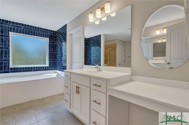 full bath with tile patterned floors, a stall shower, a bath, and vanity