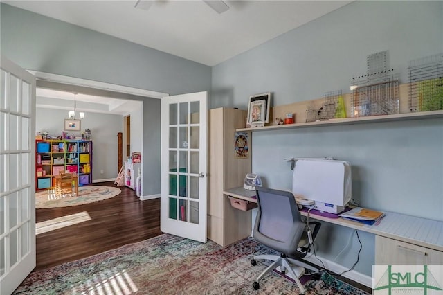 office space featuring french doors, wood finished floors, and baseboards