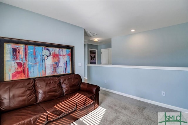 carpeted living area featuring recessed lighting and baseboards