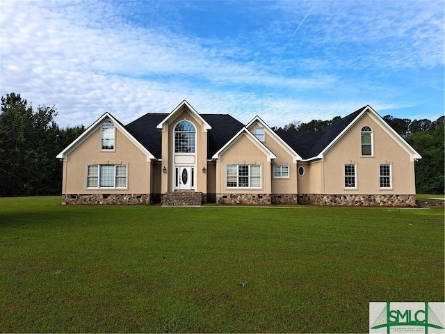 view of front of house with crawl space, a front lawn, and stucco siding