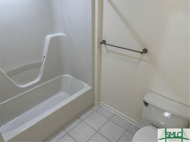 full bath with baseboards, a shower, toilet, a tub, and tile patterned floors