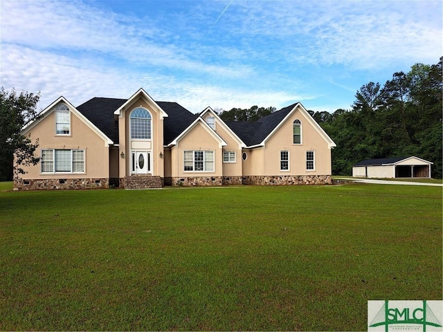 view of front of house featuring a front lawn, crawl space, and stucco siding