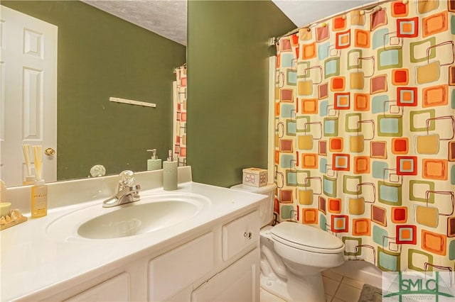 bathroom featuring vanity, a shower with shower curtain, tile patterned flooring, and toilet