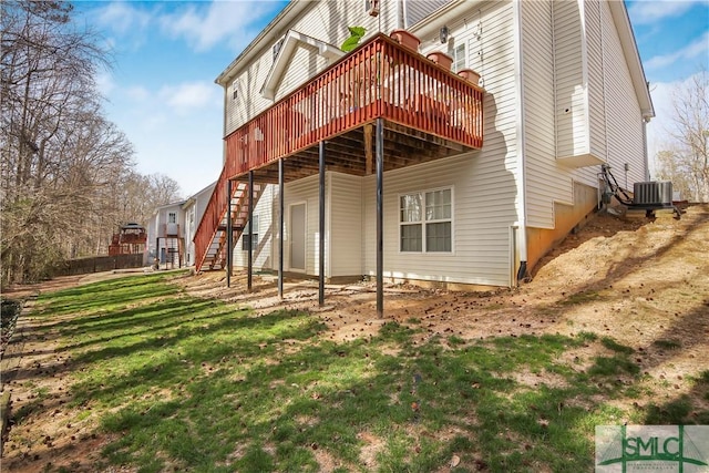 rear view of property with central AC, stairway, and a wooden deck