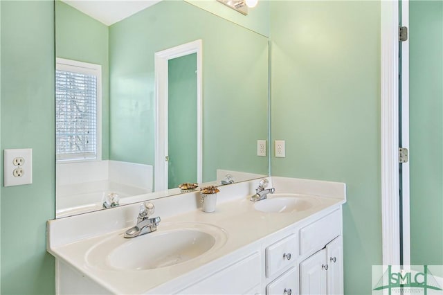 full bath featuring a sink and double vanity