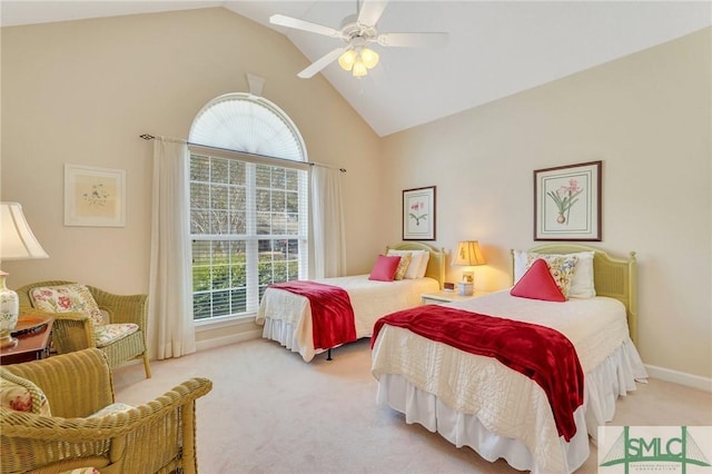 carpeted bedroom featuring high vaulted ceiling, a ceiling fan, and baseboards