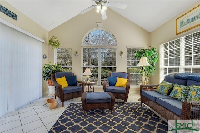 sunroom / solarium featuring ceiling fan and vaulted ceiling