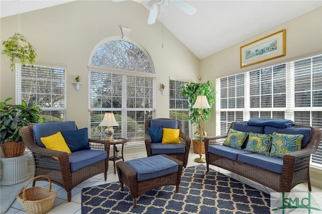 sunroom featuring vaulted ceiling and ceiling fan