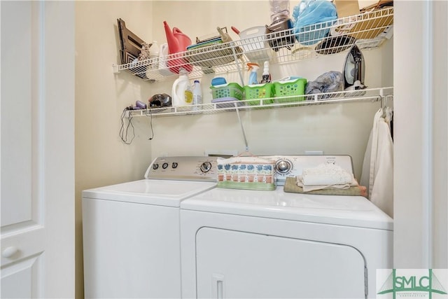 laundry room with washing machine and dryer and laundry area