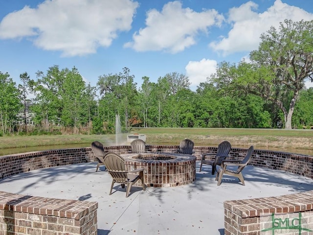 view of patio / terrace featuring a fire pit