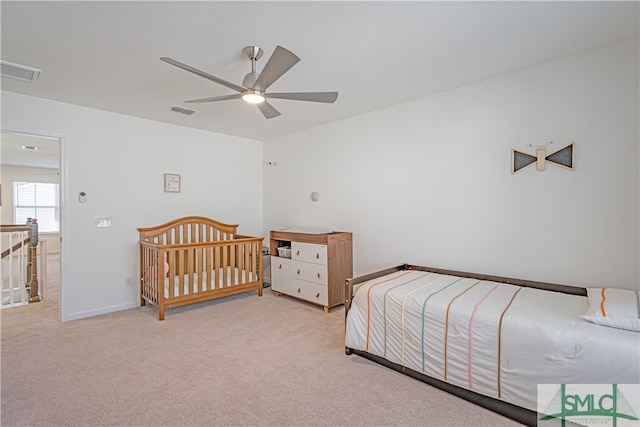 bedroom featuring carpet, visible vents, and a ceiling fan