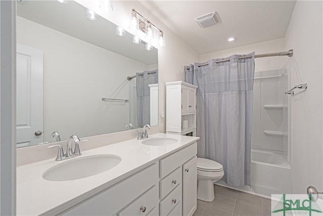 full bathroom featuring visible vents, a sink, toilet, and tile patterned floors