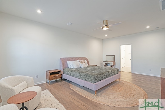 bedroom with baseboards, visible vents, ceiling fan, light wood-style floors, and recessed lighting