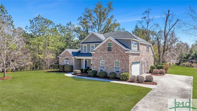 view of front facade with an attached garage, a front yard, concrete driveway, and brick siding