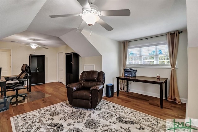 office featuring baseboards and wood finished floors