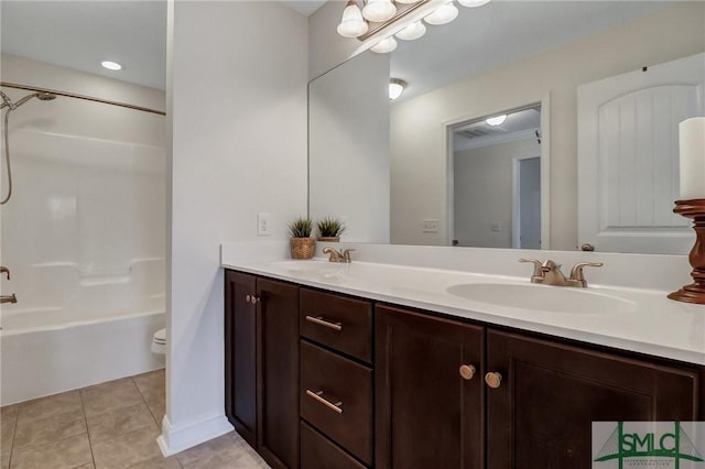 full bathroom with tile patterned flooring, shower / bath combination, a sink, and double vanity