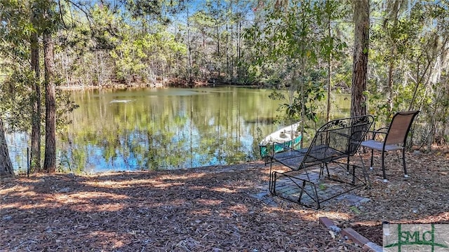 view of water feature with a wooded view