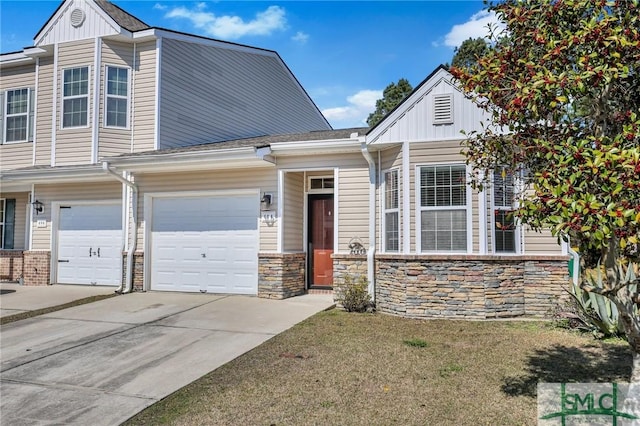 view of front of house with driveway and board and batten siding