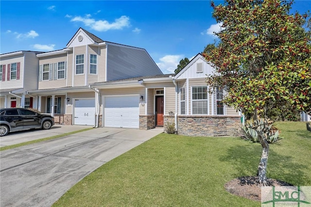 view of front of home featuring a garage, concrete driveway, stone siding, board and batten siding, and a front yard