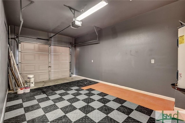 garage featuring baseboards and a garage door opener