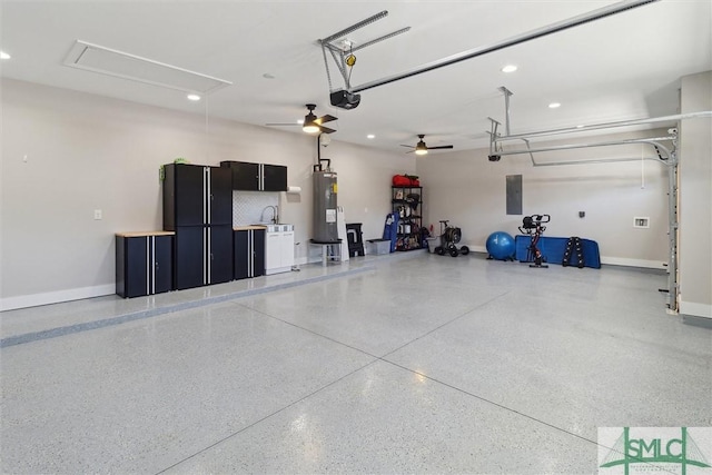 garage with electric panel, baseboards, a garage door opener, electric water heater, and a sink