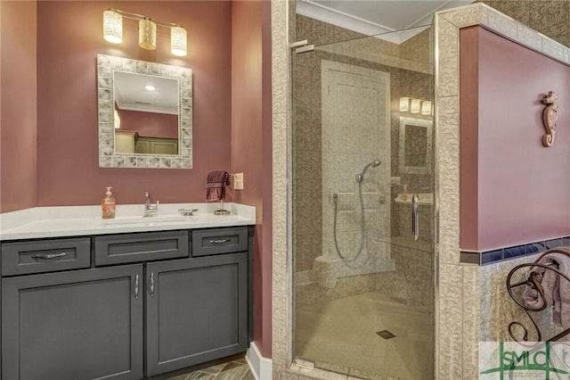 bathroom featuring a shower stall and vanity