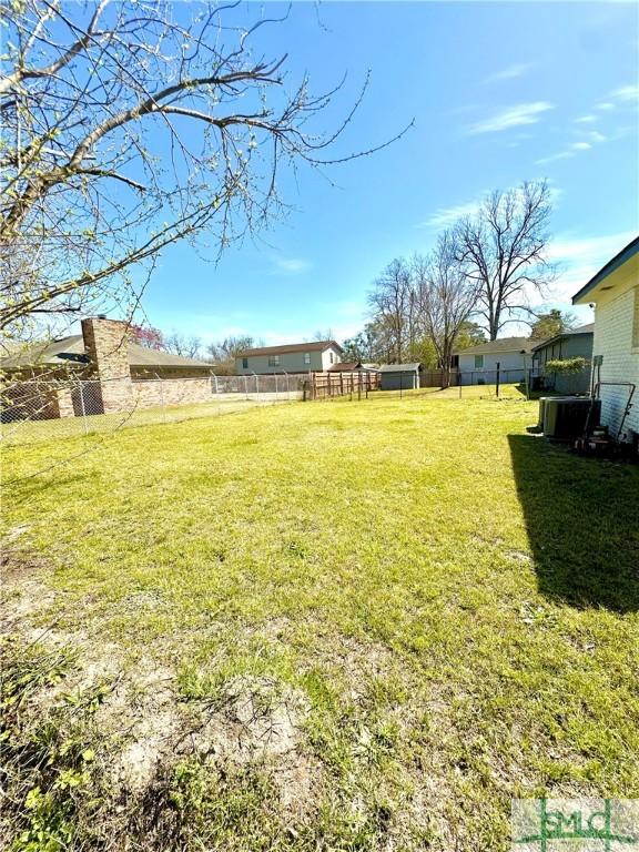 view of yard featuring fence