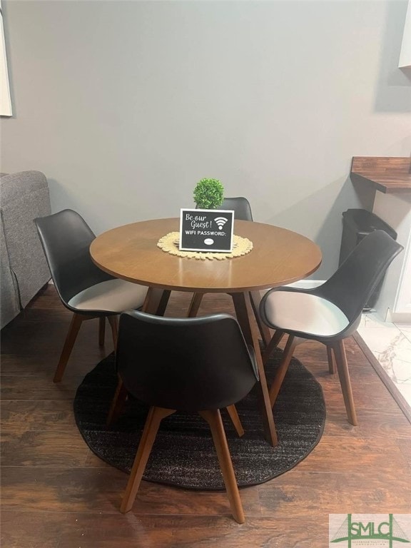 dining area featuring wood finished floors