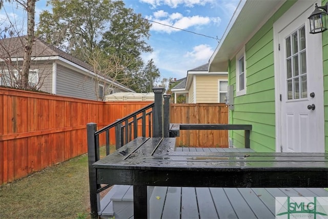 deck featuring a fenced backyard