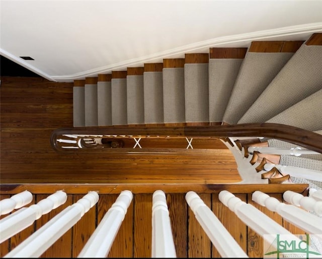 staircase with vaulted ceiling