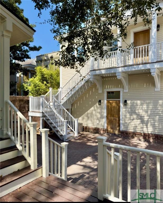 exterior space featuring a patio area and stairs