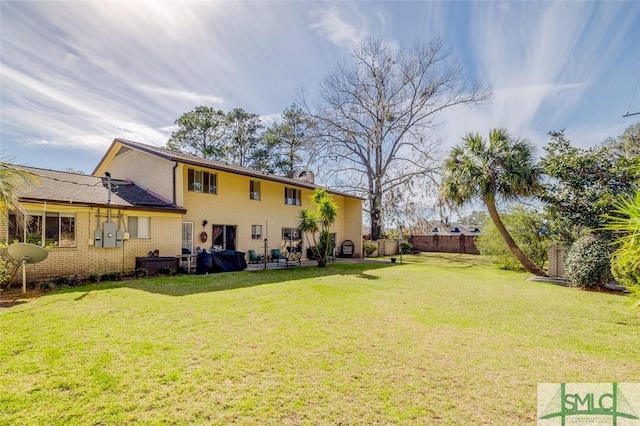 view of yard with a patio area and fence