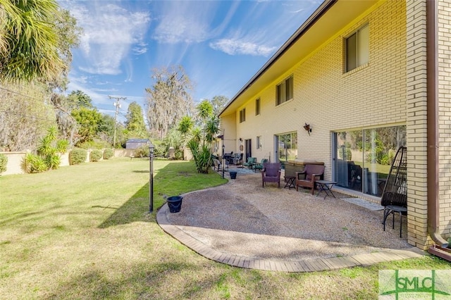 view of yard with a patio area