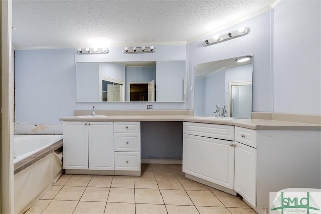 full bathroom featuring tile patterned flooring, crown molding, a textured ceiling, and vanity