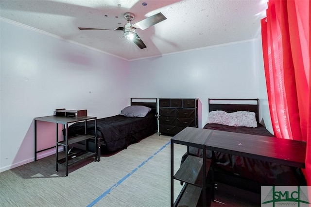 bedroom with baseboards, a textured ceiling, a ceiling fan, and crown molding